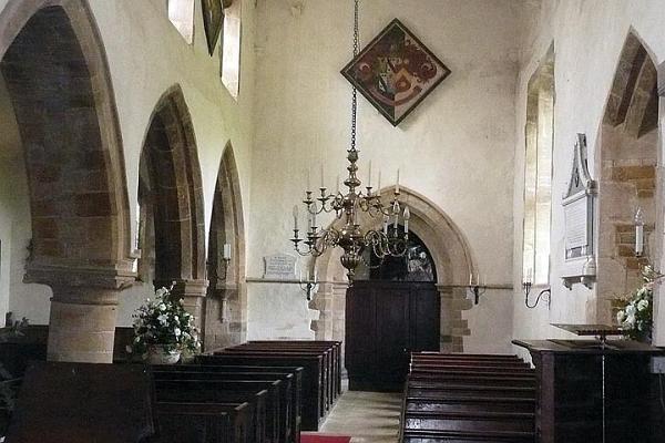 13. Interior of church - note hatchment with black backgound denoting death of the bearer of the heraldic arms.jpg